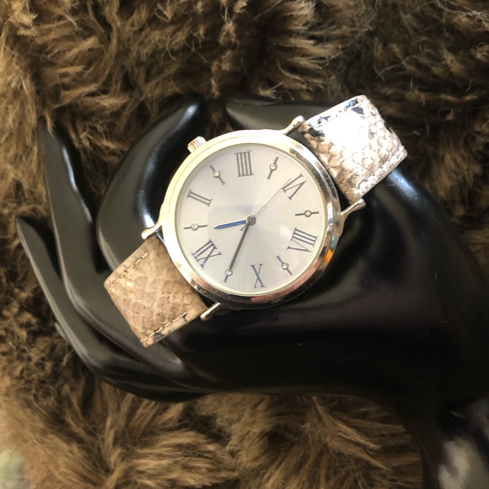 Ladies Roman numeral snake skin leather band watch